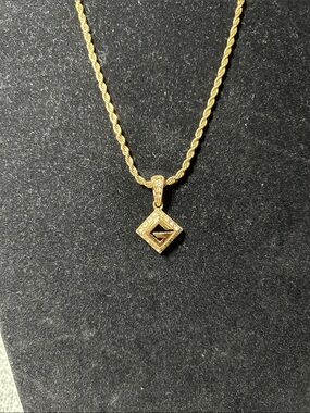 448.  Vintage Givenchy "G" logo diamond-shaped pendant necklace